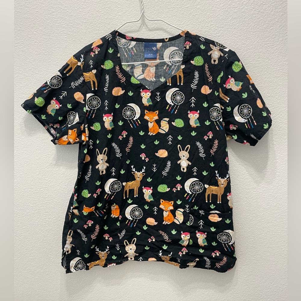 Size medium womens scrub top. Zoe and Chloe brand. Used, washed and worn x1.
